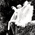 Ethereal figure in light and shadow titled Perrin Angel 2 by Millie Franz, archival photographic print, available at Ilkaa's Fine Art Gallery.
