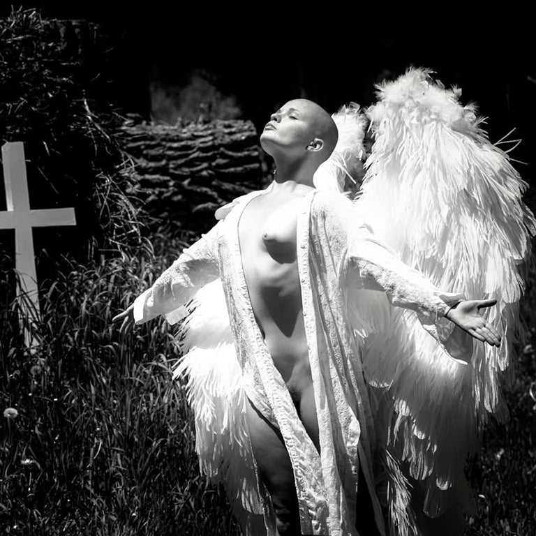 Ethereal angelic figure in light and shadow by Millie Franz, archival photographic print, available at Ilkaa's Fine Art Gallery.