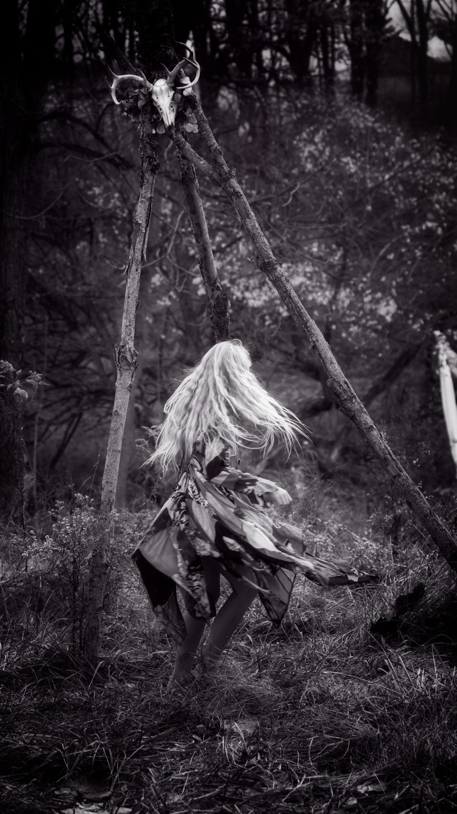 Young girl dancing wearing a ram’s skull, evocative and symbolic, by Millie Franz, archival photographic print, available at Ilkaa's Fine Art Gallery.
