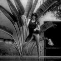 Black and white photograph featuring bold contrasts and elegant human form by Millie Franz, archival photographic print, available at Ilkaa's Fine Art Gallery.